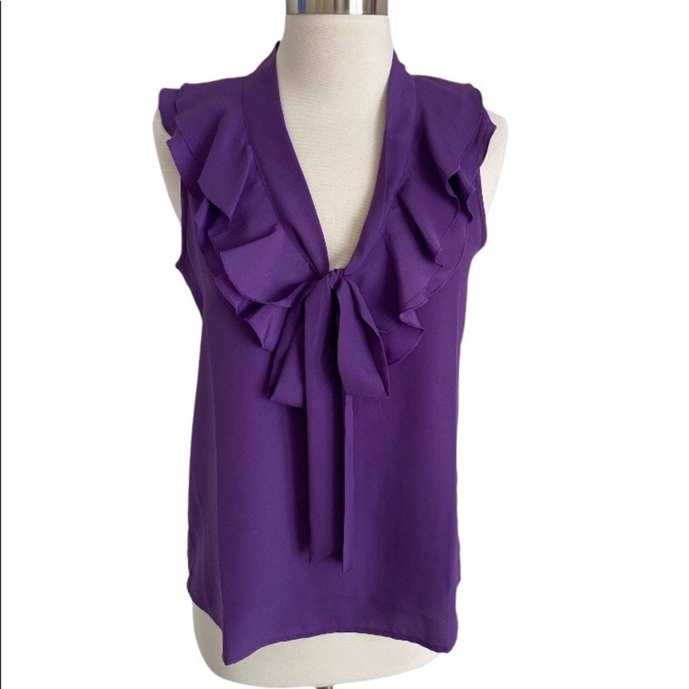 Loft Blouse with ruffle neckline.
